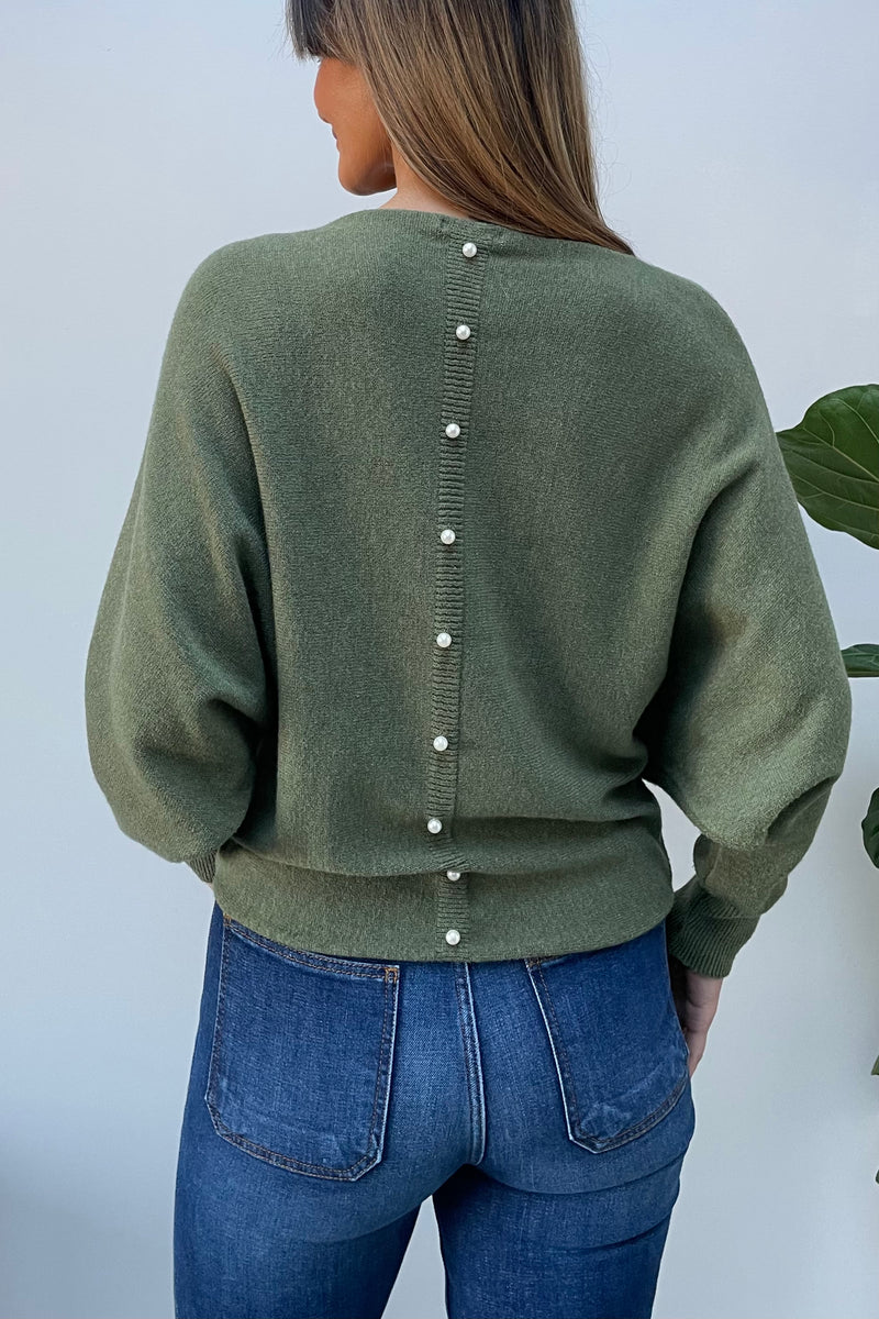 Sweater with pearl buttons clearance